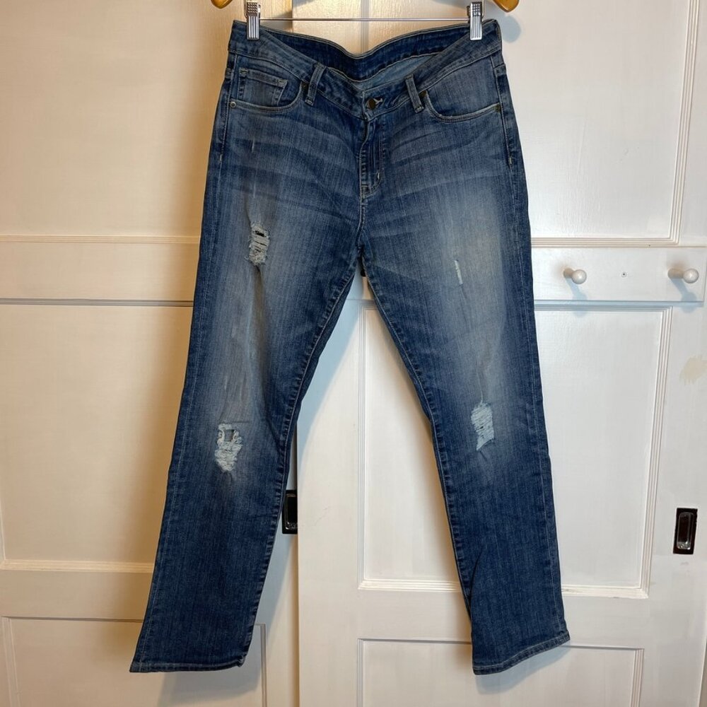 Medium Wash Stretch Denim with light Distressing